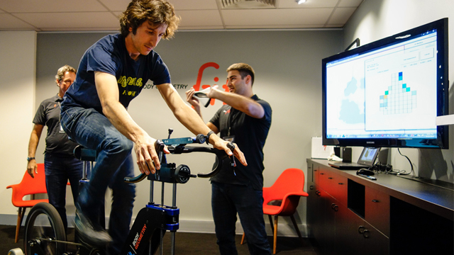 Specialized product engineers use a live feed, an adjustable bike like object and pressure mapping to show the impact of changes to bike set up and saddle design in real time (Kath Bicknell).