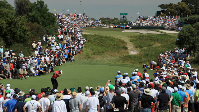 Tiger Woods plays a tee shot during the 2011 Presidents Cup (Getty)