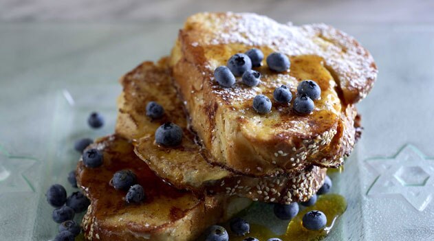French toast challah with maple syrup and blueberries