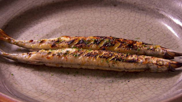 Garlic and garfish over coals
