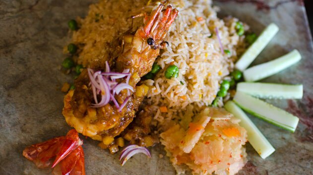 Pan-fried prawns with prahok rice