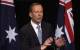 play [Abbott accused of hiding cuts]