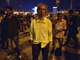 Lone vigil prompts silent protests in Turkey