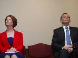Gillard rises above negative poll results