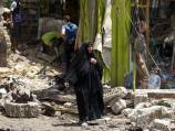 String of bombings kill 13 in Iraq market