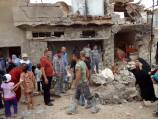Iraq car bombs kill 12, wound 30