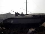 Syria, Israel exchange fire over border