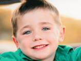 Injured Queensland boy wakes from coma