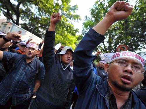 Demonstrators protest against Myanmar's treatment of Muslim Rohingya outside the Myanmar embassy in Jakarta. (Getty)