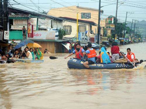 At least 15 people were confirmed dead as the capital of Manila and nearby provinces suffered extensive flooding. (Getty Images)