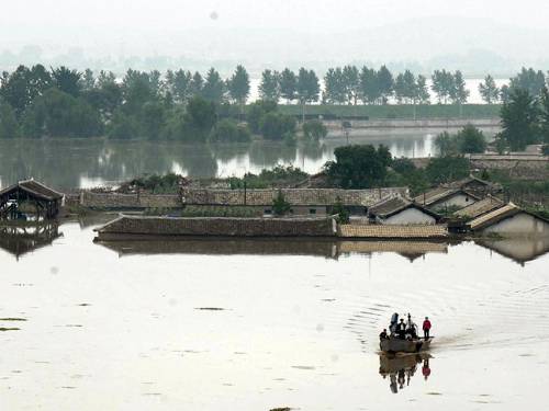 houses submerged by flood water in Anju City on the west coast of North Korea (North Korea's Korean Central News Agency (KCNA/EPA)