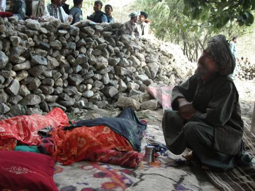 A massive landslide of mud and rocks buried entire houses in the remote mountain village of Sayi Hazara. (AAP)