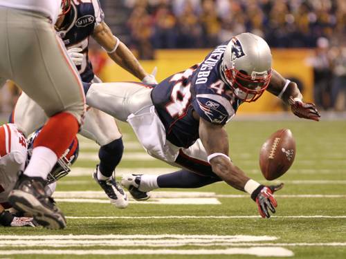 James Ihedigbo from the Patriots goes after a loose ball. (Getty)