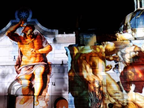 Visions of the apocalypse - Michelangelo's Last Judgment, projected on a Roman building. (AFP)