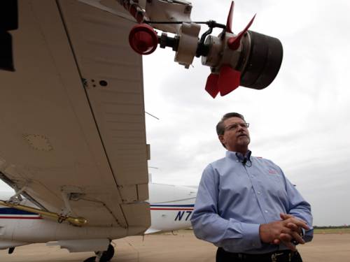 Mike Stuart of Dynamic Aviation describes the plane involved in the aerial spraying process. (AAP)