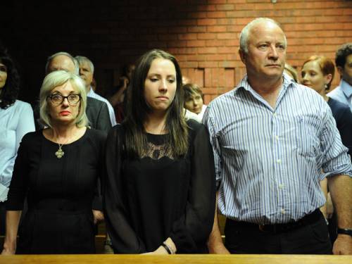 The father of South African Olympic sprinter Oscar Pistorius, Henke and his sister Aimee attend an audience of Oscar Pistorius' bail hearing. (AAP)