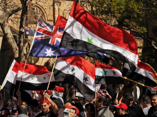 Demonstrators march in Sydney in support of President Bashar al-Assad and against the intervention of foreign powers in Syria. (AAP)