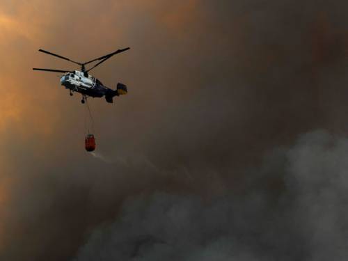Four people have been killed and 23 injured after bush fires swept through the Catalonia region of Spain. (Getty Images)