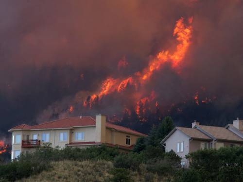 The fire - which destroyed 300 homes and forced some 36,000 people to evacuate - is just 15 percent contained. (Photo: AP)