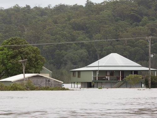 Flooding isolates about 4000 people on the New South Wales north coast. (AAP)