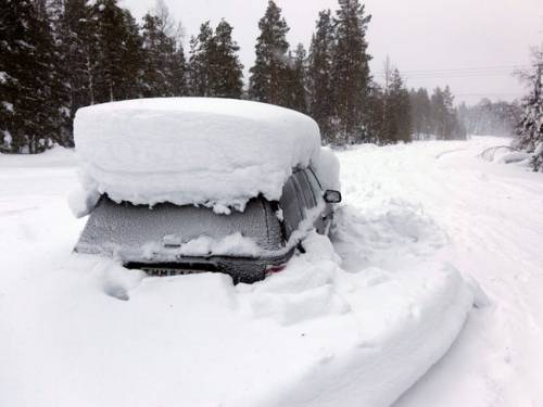 A middle-aged Swedish man was found alive in this car after being trapped by snow for at least two months. (EPA)