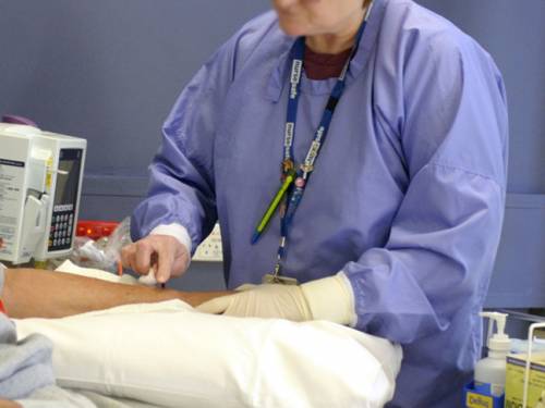 Nurses, police and teachers will be shielded from the axe wielding, but Unions NSW says those frontline workers will end up doing paperwork previously carried out by colleagues lost in the job cuts. (AAP)