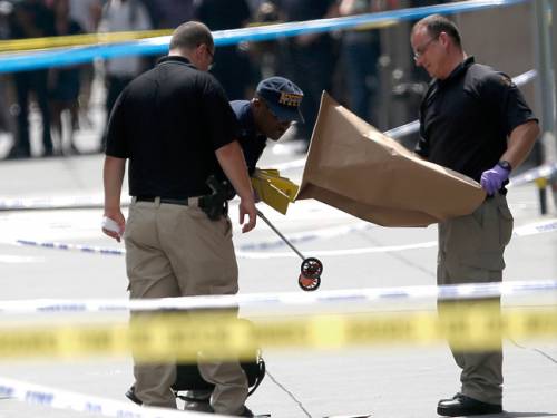 Police collect evidence at the scene. (AAP)