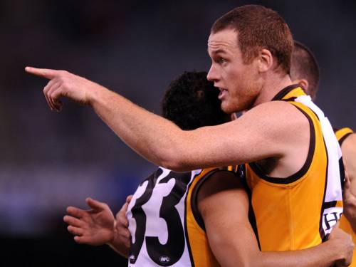 Hawthorn climbed into the AFL's top four doing a demolition job on the struggling Western Bulldogs. (AAP)