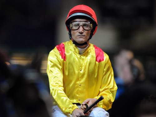 Champion jockey Damien Oliver is under investigation for allegedly placing a bet on a rival horse. (AAP)