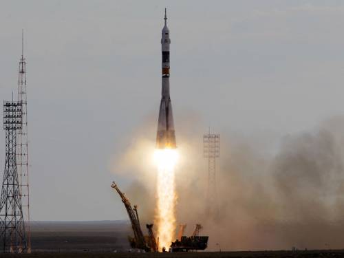 A Russian rocket carrying an international crew of three has blasted off without a hitch. (AAP)