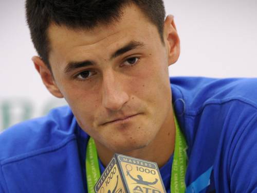 Tennis ace Bernard Tomic admits not giving 100 per cent after crashing out of the Shanghai Masters. (AAP)