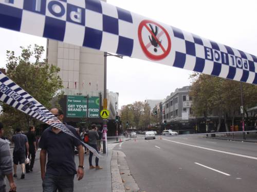 A man is in hospital and another is being treated at the scene after an alleged shooting in Sydney. (AAP)