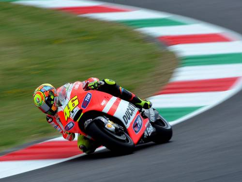Valentino Rossi (pic) says he can work with rival Jorge Lorenzo when he rejoins him at Yamaha. (AAP)