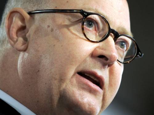 News Ltd chief executive Kim Williams says he will fight media regulation changes in the High Court. (AAP)