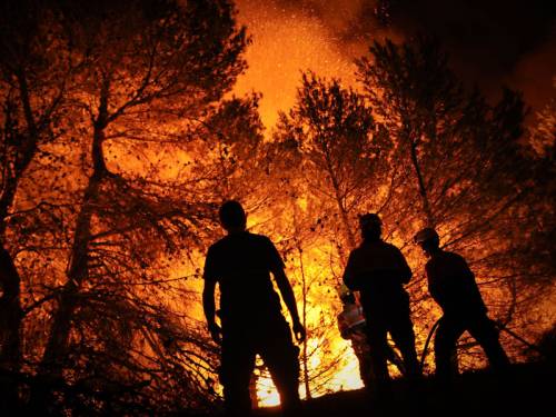 Thousands of people have fled their homes as fires rage across Spain's Canary Islands. (AAP)