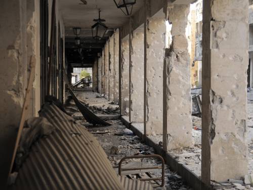 At least 20 soldiers have been killed in twin explosions in the southern Syrian city of Deraa. (AAP)