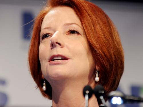 Prime Minister Julia Gillard relaxes after a long hard day at the office by doing some knitting and says the repetitive task is soothing. (AAP)