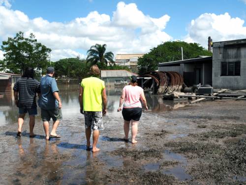 Authorities have so far assessed 3670 flood-damaged houses in Bundaberg, with 38 houses rated as unliveable. (AAP)
