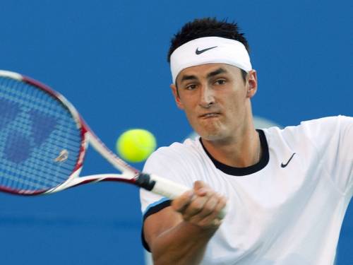 Australian Bernard Tomic survived a sapping four-setter to reach the second round of the US Open. (AAP)