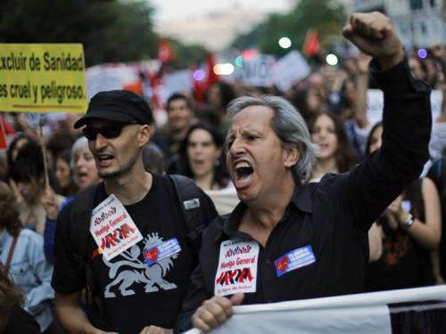 Several thousand people have marched in downtown Madrid to demand an end to austerity measures. (AAP)