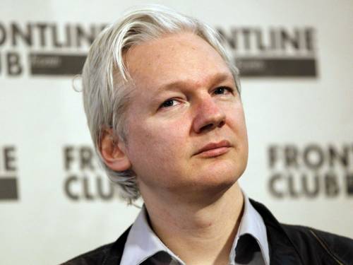 Britain has threatened to revoke the embassy's diplomatic immunity and take the WikiLeaks founder into custody for breaching his bail conditions. (AAP)