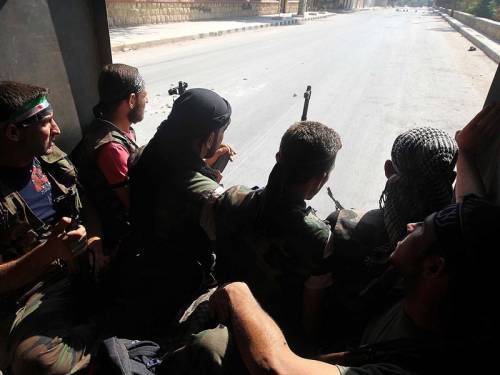 According to activists, rebels who launched an operation to take over Syria's largest city a week ago are estimated to control between a third and half of Aleppo's neighbourhoods. (AAP)