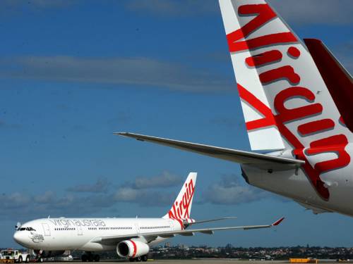 Virgin Australia has returned to profitability due to its growth in the corporate travel sector. (AAP)