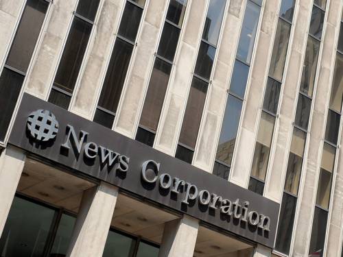 Rupert Murdoch's media giant News Corporation has suffered a 55 per cent full year earnings slide. (AAP)