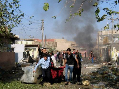 A wave of attacks, including six car bombs, has killed 19 people and wounded 71 others in Iraq. (AAP)