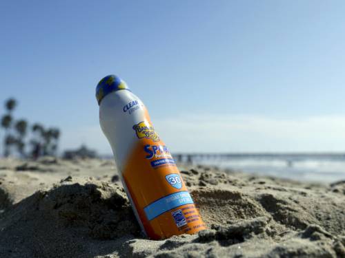 The maker of Banana Boat sunscreen is recalling 500,000 bottles of lotion over a fire risk. (AAP)