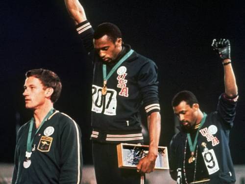 Federal parliament has apologised to late Australian sprinter Peter Norman for the way he was treated after participating in a 'black power' salute at the 1968 Mexico Olympics. (AAP)