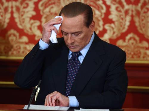 Former Italian PM Silvio Berlusconi says he will stay in politics to reform Italy's justice system. (AAP)