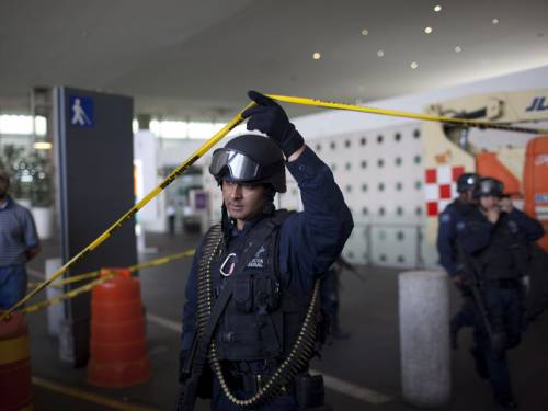 Gunmen shot dead three policemen on an anti-drug operation at Mexico City's international airport. (AAP)