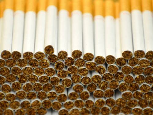Travellers will be permitted to bring only 50 duty-free cigarettes into Australia from Saturday. (AAP)